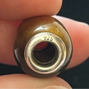 Sterling silver brown bead. Stamped 925